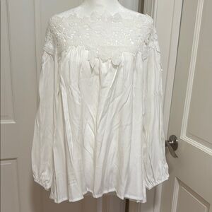 Chic White Blouse with Elegant Detailing